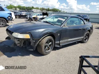 2000 Ford Mustang with VIN 1FAFP4045YF233922, listed as a Copart auction lot 56036735 with 264,004 mi miles and Salvage title. Bid and sale history available at DreamBid. Image 1.