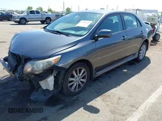 2009 Toyota Corolla with VIN 1NXBU40E69Z034459, listed as a IAAI auction lot 42095649 with 173,296 mi miles. Bid and sale history available at carsss.com. Image 2.