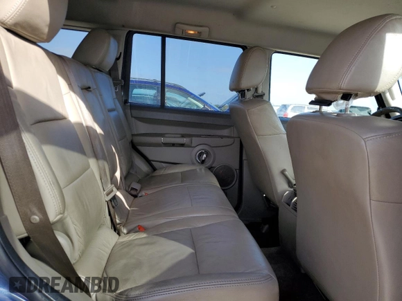 2010 Jeep Commander Sport z VIN 1J4RH4GK9AC122462, wystawiony jako Copart lot #85060484 z przebiegiem 178 901 mil mil oraz Szkoda całkowita • Salvage title. Historia ofert i sprzedaży dostępna na DreamBid. Obrazek 11.