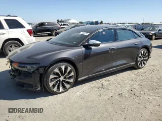2022 Lucid Air Grand Touring z VIN 50EA1GBA8NA004844, wystawiony jako Copart lot #72620264 z przebiegiem 28 478 mil mil oraz Szkody całkowita. Historia ofert i sprzedaży dostępna na DreamBid. Obrazek 1.