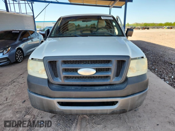 2007 Ford F-150 XL with VIN 1FTRF12277NA85488, listed as a Copart auction lot 60299875 with 219,127 mi miles and Salvage title. Bid and sale history available at DreamBid. Image 5.