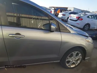 2010 Mazda 5 Sport z VIN JM1CR2W30A0384041, wystawiony jako IAAI lot #41134158 z przebiegiem 178 540 mil mil oraz . Historia ofert i sprzedaży dostępna na DreamBid. Obrazek 18.