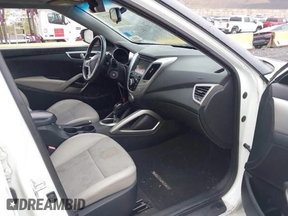 2013 Hyundai Veloster w/Gray Int с VIN KMHTC6AD5DU089115, выставлен на аукционе IAAI как лот 42498078 с пробегом 119 144 миль миль и . История ставок и продаж доступна на DreamBid. Изображение 5.