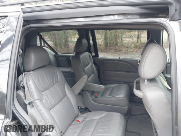 2010 Honda Odyssey EX-L with VIN 5FNRL3H75AB021480, listed as a IAAI auction lot 41793994 with 169,386 mi miles and . Bid and sale history available at DreamBid. Image 8.