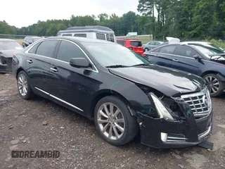 2013 Cadillac XTS Luxury with VIN 2G61P5S39D9168027, listed as a IAAI auction lot 42706132 with 106,845 mi miles and . Bid and sale history available at DreamBid. Image 1.