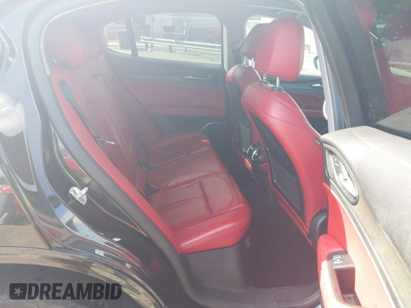 2020 Alfa Romeo Stelvio Ti z VIN ZASPAKBN7L7C92393, wystawiony jako IAAI lot #41824452 z przebiegiem 53 616 mil mil oraz . Historia ofert i sprzedaży dostępna na DreamBid. Obrazek 8.