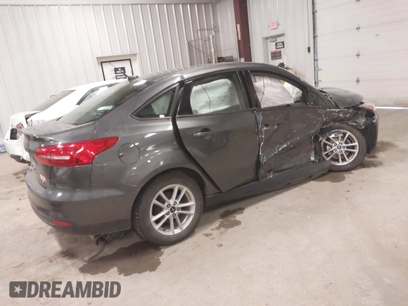 2018 Ford Focus SE with VIN 1FADP3F22JL298144, listed as a IAAI auction lot 41880555 with 73,166 mi miles. Bid and sale history available at carsss.com. Image 4.