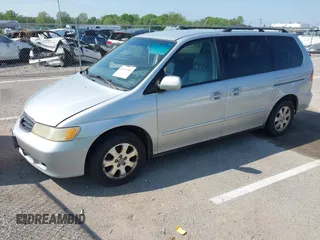 2003 Honda Odyssey EX-L with VIN 5FNRL18983B050769, listed as a IAAI auction lot 42113963 with 287,552 mi miles and . Bid and sale history available at DreamBid. Image 2.