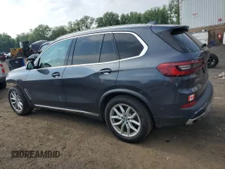 2019 BMW X5 xDrive40i with VIN 5UXCR6C57KLL11051, listed as a Copart auction lot 60268695 with 169,671 mi miles and Salvage title. Bid and sale history available at DreamBid. Image 2.