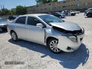 2009 Toyota Corolla with VIN JTDBL40E299062723, listed as a Copart auction lot 52899515 with 183,666 mi miles and Salvage Title. Bid and sale history available at carsss.com. Image 4.