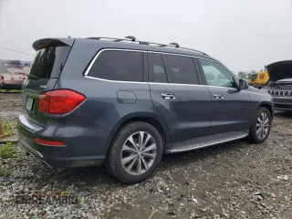 2015 Mercedes-Benz GL 450 z VIN 4JGDF6EE7FA455093, wystawiony jako Copart lot #57187135 z przebiegiem 105 573 mil mil oraz Tytuł czysty. Historia ofert i sprzedaży dostępna na DreamBid. Obrazek 3.
