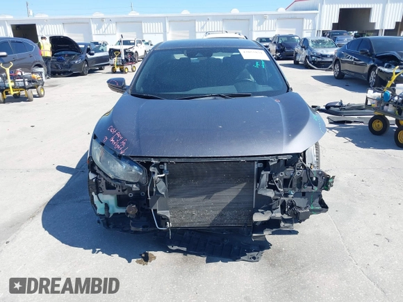 2019 Honda Civic Sport with VIN 19XFC2F89KE019683, listed as a IAAI auction lot 42055871 with 107,941 mi miles and . Bid and sale history available at DreamBid. Image 13.