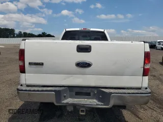2005 Ford F-150 XL with VIN 1FTVF12585NA40842, listed as a Copart auction lot 61728465 with 288,002 mi miles and Salvage title. Bid and sale history available at DreamBid. Image 6.