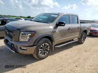 2021 Nissan Titan Pro-4X с VIN 1N6AA1EDXMN523826, выставлен на аукционе Copart как лот 61851765 с пробегом 85 783 миль миль и Списание • Salvage title. История ставок и продаж доступна на DreamBid. Изображение 1.