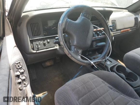 1998 Jeep Grand Cherokee Laredo with VIN 1J4GZ48S5WC289251, listed as a Copart auction lot 63594685 with 156,358 mi miles and Salvage title. Bid and sale history available at DreamBid. Image 8.