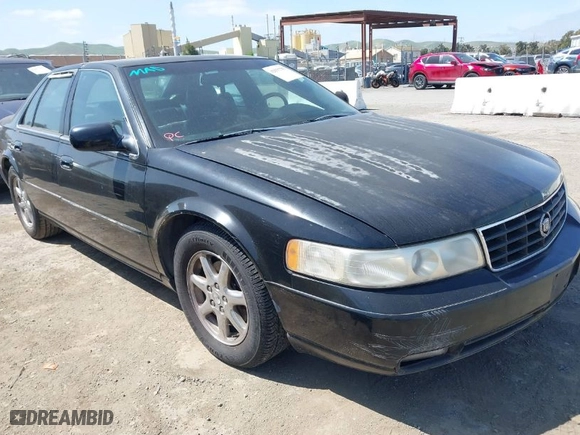 1998 Cadillac Seville Touring STS with VIN 1G6KY5499WU916185, listed as a IAAI auction lot 42035783 with 164,763 mi miles. Bid and sale history available at carsss.com. Image 1.