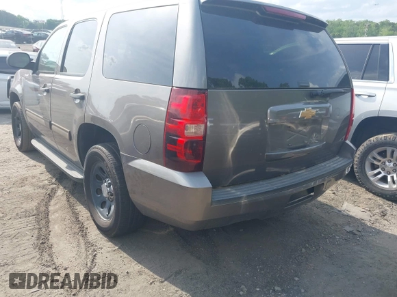 2012 Chevrolet Tahoe Commercial with VIN 1GNLC2E07CR187432, listed as a IAAI auction lot 42126539 with 169,607 mi miles and . Bid and sale history available at DreamBid. Image 3.