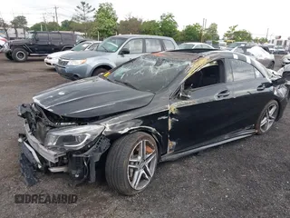 2014 Mercedes-Benz CLA 45 AMG with VIN WDDSJ5CB5EN067774, listed as a IAAI auction lot 42373325 with 108,428 mi miles and . Bid and sale history available at DreamBid. Image 2.