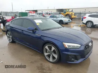 2021 Audi A5 Sportback S line Prestige z VIN WAUEACF50MA003498, wystawiony jako IAAI lot #41560364 z przebiegiem 50 918 mil mil oraz . Historia ofert i sprzedaży dostępna na DreamBid. Obrazek 1.
