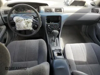 2000 Toyota Camry CE z VIN JT2BG22K2Y0479735, wystawiony jako Copart lot #50226755 z przebiegiem 282 694 mil mil oraz Nie do naprawy • Non repairable. Historia ofert i sprzedaży dostępna na DreamBid. Obrazek 8.
