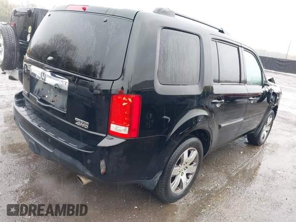 2014 Honda Pilot Touring with VIN 5FNYF4H91EB055741, listed as a IAAI auction lot 42006752 with 222,308 mi miles and . Bid and sale history available at carsss.com. Image 4.