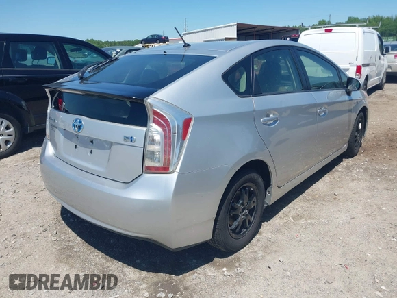 2015 Toyota Prius Four with VIN JTDKN3DU8F2000933, listed as a IAAI auction lot 42113155 with 212,443 mi miles and . Bid and sale history available at DreamBid. Image 4.