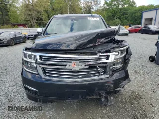 2015 Chevrolet Suburban LTZ with VIN 1GNSKKKC4FR119803, listed as a Copart auction lot 51416775 with 135,366 mi miles and Salvage Title. Bid and sale history available at DreamBid. Image 5.