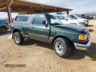 1997 Ford Ranger XLT with VIN 1FTCR10AXVPB26107, listed as a Copart auction lot 49113425 with 148,630 mi miles and Salvage Title. Bid and sale history available at DreamBid. Image 4.