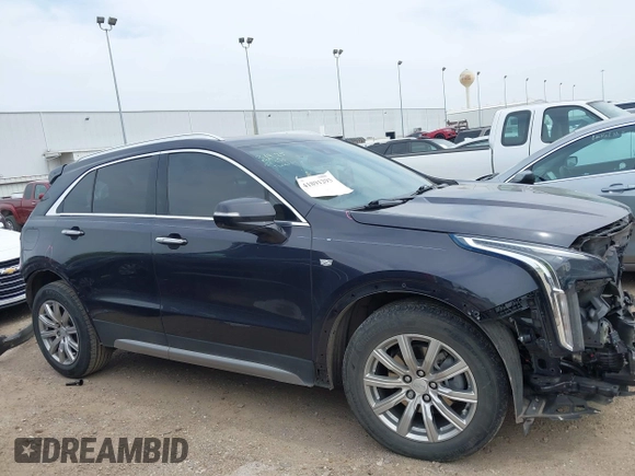 2023 Cadillac XT4 FWD Premium Luxury with VIN 1GYFZCR4XPF101409, listed as a IAAI auction lot 41891293 with 29,355 mi miles and . Bid and sale history available at carsss.com. Image 14.