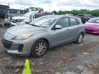 2012 Mazda 3 i Touring with VIN JM1BL1L79C1607995, listed as a IAAI auction lot 42254595 with 203,809 mi miles and . Bid and sale history available at DreamBid. Image 2.