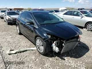 2017 Ford Focus Titanium with VIN 1FADP3N23HL279694, listed as a Copart auction lot 53452725 with 92,740 mi miles and Salvage Title. Bid and sale history available at carsss.com. Image 14.