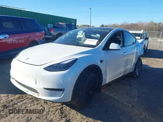 2023 Tesla Model Y Long Range with VIN 7SAYGAEE3PF753657, listed as a IAAI auction lot 41668917 with 33,301 mi miles and . Bid and sale history available at DreamBid. Image 25.