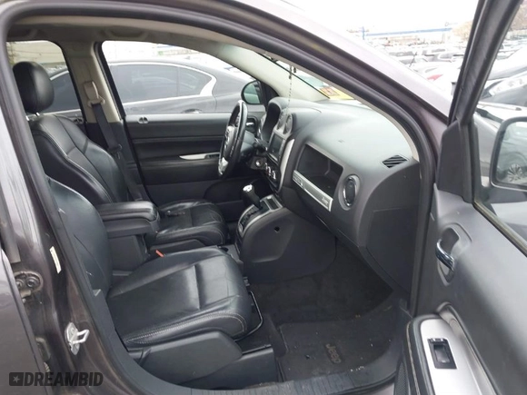 2015 Jeep Compass Latitude with VIN 1C4NJDEB9FD105996, listed as a IAAI auction lot 41729501 with 147,954 mi miles. Bid and sale history available at carsss.com. Image 5.