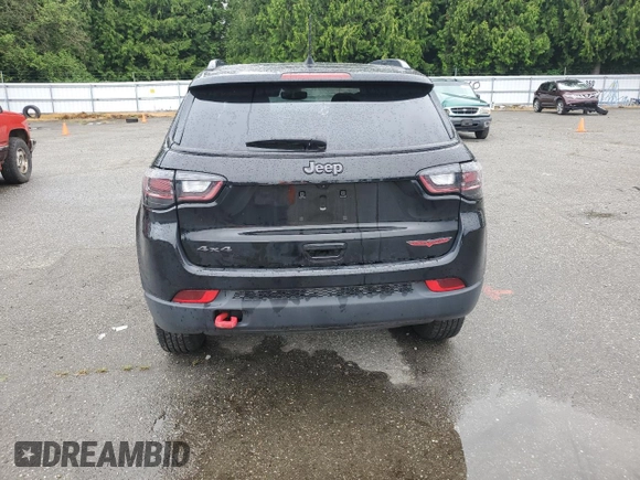 2023 Jeep Compass Trailhawk z VIN 3C4NJDDN9PT501952, wystawiony jako Copart lot #58842985 z przebiegiem Nie podano mil oraz Szkoda całkowita • Salvage title. Historia ofert i sprzedaży dostępna na DreamBid. Obrazek 6.