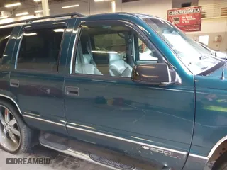 1997 Chevrolet Tahoe with VIN 1GNEK13R8VJ411512, listed as a IAAI auction lot 41583085 with 239,481 mi miles. Bid and sale history available at carsss.com. Image 6.