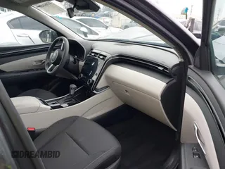 2023 Hyundai Tucson SEL z VIN KM8JBCAE9PU242486, wystawiony jako IAAI lot #41860406 z przebiegiem 25 294 mil mil oraz . Historia ofert i sprzedaży dostępna na DreamBid. Obrazek 5.