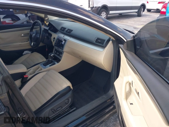 2010 Volkswagen CC Sport with VIN WVWMN7AN8AE531621, listed as a IAAI auction lot 42095130 with 111,923 mi miles and . Bid and sale history available at DreamBid. Image 5.