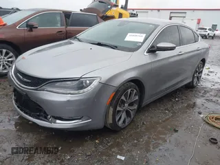 2015 Chrysler 200 C with VIN 1C3CCCCG4FN509765, listed as a IAAI auction lot 41080368 with 86,378 mi miles and . Bid and sale history available at carsss.com. Image 2.