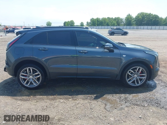 2021 Cadillac XT4 FWD Sport with VIN 1GYFZER41MF079193, listed as a IAAI auction lot 42331594 with 72,287 mi miles and . Bid and sale history available at DreamBid. Image 14.