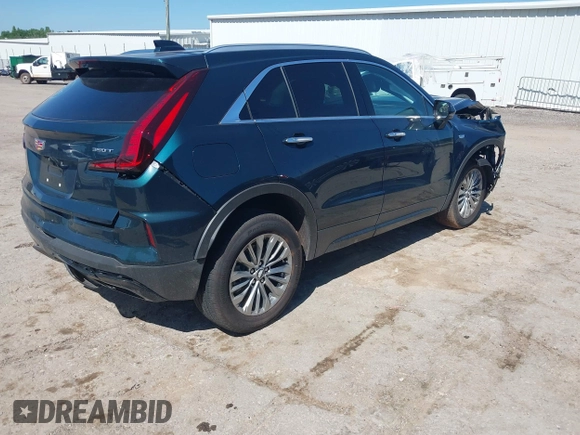 2025 Cadillac XT4 FWD Premium Luxury z VIN 1GYFZCR47SF146106, wystawiony jako IAAI lot #42324320 z przebiegiem 4 601 mil mil oraz . Historia ofert i sprzedaży dostępna na DreamBid. Obrazek 4.