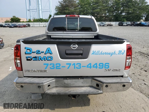 2014 Nissan Frontier SV with VIN 1N6AD0FV1EN734214, listed as a Copart auction lot 59261715 with 114,413 mi miles and Salvage title. Bid and sale history available at DreamBid. Image 6.