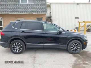 2021 Volkswagen Tiguan SE z VIN 3VV3B7AXXMM101773, wystawiony jako IAAI lot #42358588 z przebiegiem 105 629 mil mil oraz . Historia ofert i sprzedaży dostępna na DreamBid. Obrazek 14.