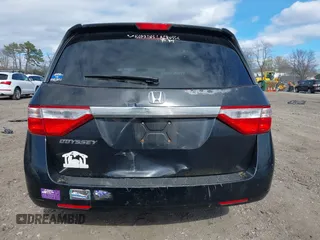 2011 Honda Odyssey EX with VIN 5FNRL5H4XBB011918, listed as a IAAI auction lot 42056043 with 201,821 mi miles and . Bid and sale history available at carsss.com. Image 6.