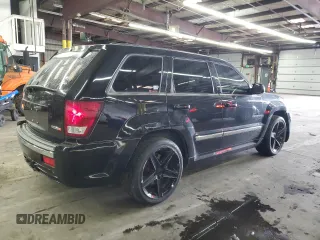2008 Jeep Grand Cherokee SRT-8 with VIN 1J8HR78378C168740, listed as a Copart auction lot 87053654 with 139,760 mi miles and Salvage Title. Bid and sale history available at carsss.com. Image 3.