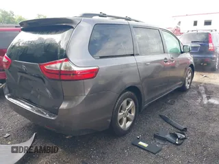 2015 Toyota Sienna LE AAS with VIN 5TDKK3DC8FS632906, listed as a IAAI auction lot 42533867 with 128,980 mi miles and . Bid and sale history available at DreamBid. Image 4.