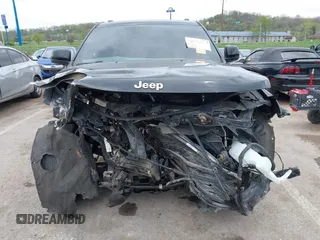 2017 Jeep Grand Cherokee Laredo with VIN 1C4RJFAG2HC649408, listed as a IAAI auction lot 42072440 with 58,818 mi miles and . Bid and sale history available at DreamBid. Image 12.