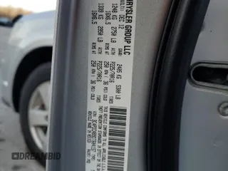 2013 Dodge Journey American Value with VIN 3C4PDCAB9DT604157, listed as a Copart auction lot 48206675 with 158,392 mi miles and Salvage Title. Bid and sale history available at DreamBid. Image 13.