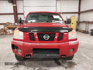 2012 Nissan Titan SV with VIN 1N6AA0EC7CN327973, listed as a IAAI auction lot 41841596 with 148,519 mi miles. Bid and sale history available at carsss.com. Image 12.
