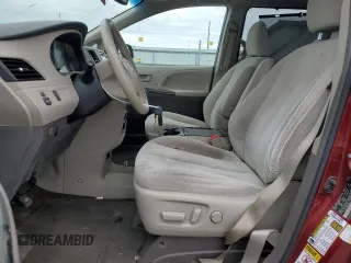 2014 Toyota Sienna LE with VIN 5TDJK3DC5ES093932, listed as a Copart auction lot 63611985 with 142,044 mi miles and Salvage title. Bid and sale history available at DreamBid. Image 7.