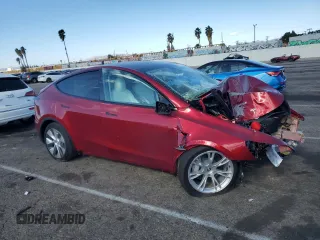 2024 Tesla Model Y Long Range with VIN 7SAYGDEE7RF009984, listed as a Copart auction lot 41662185 with Not Provided miles and Salvage Title. Bid and sale history available at DreamBid. Image 4.